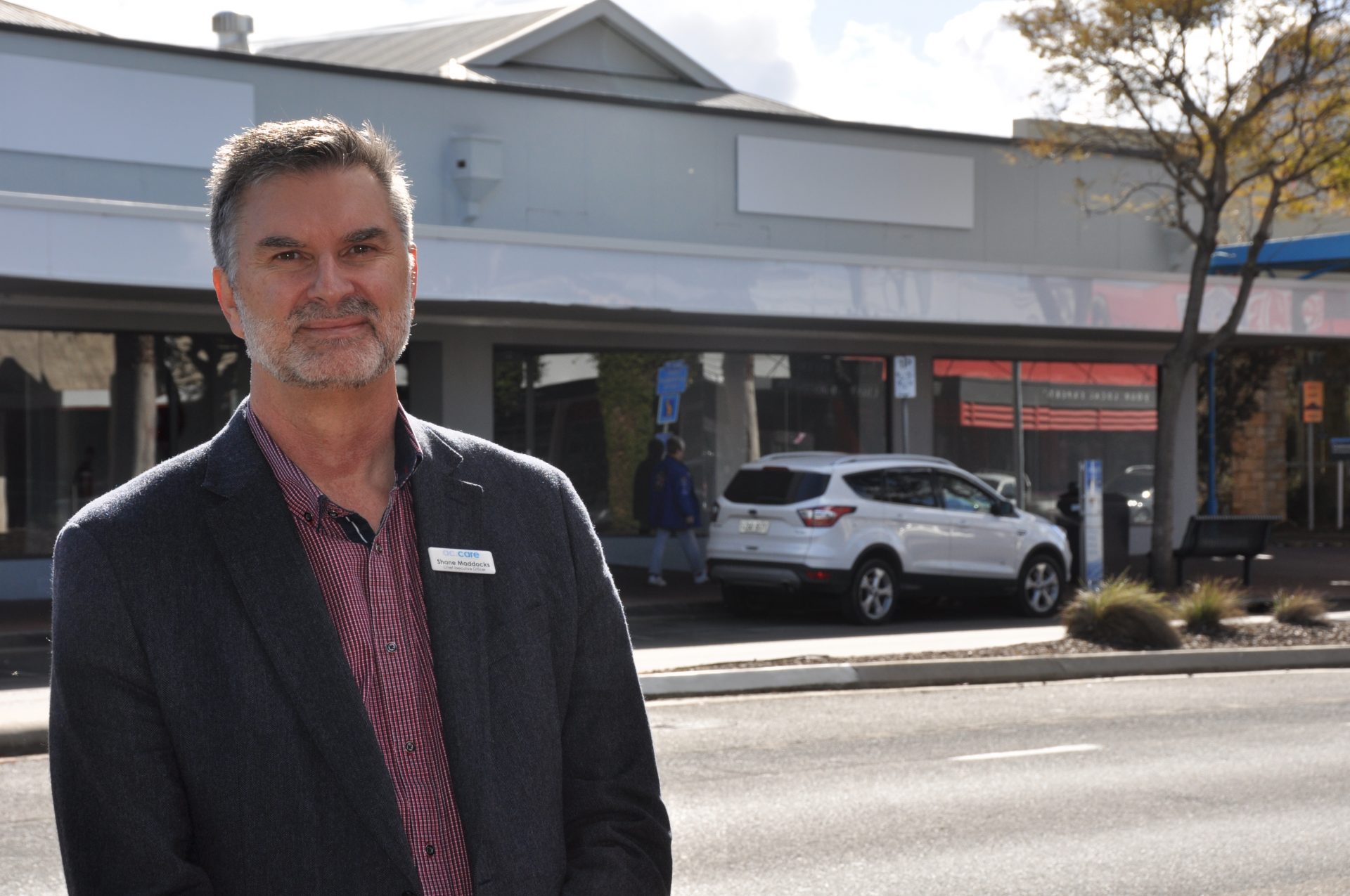 NEW LOCATION: ac.care chief executive officer Shane Maddocks outside the Bridge Street office building, where the regional social welfare agency’s services will be consolidated at one site.