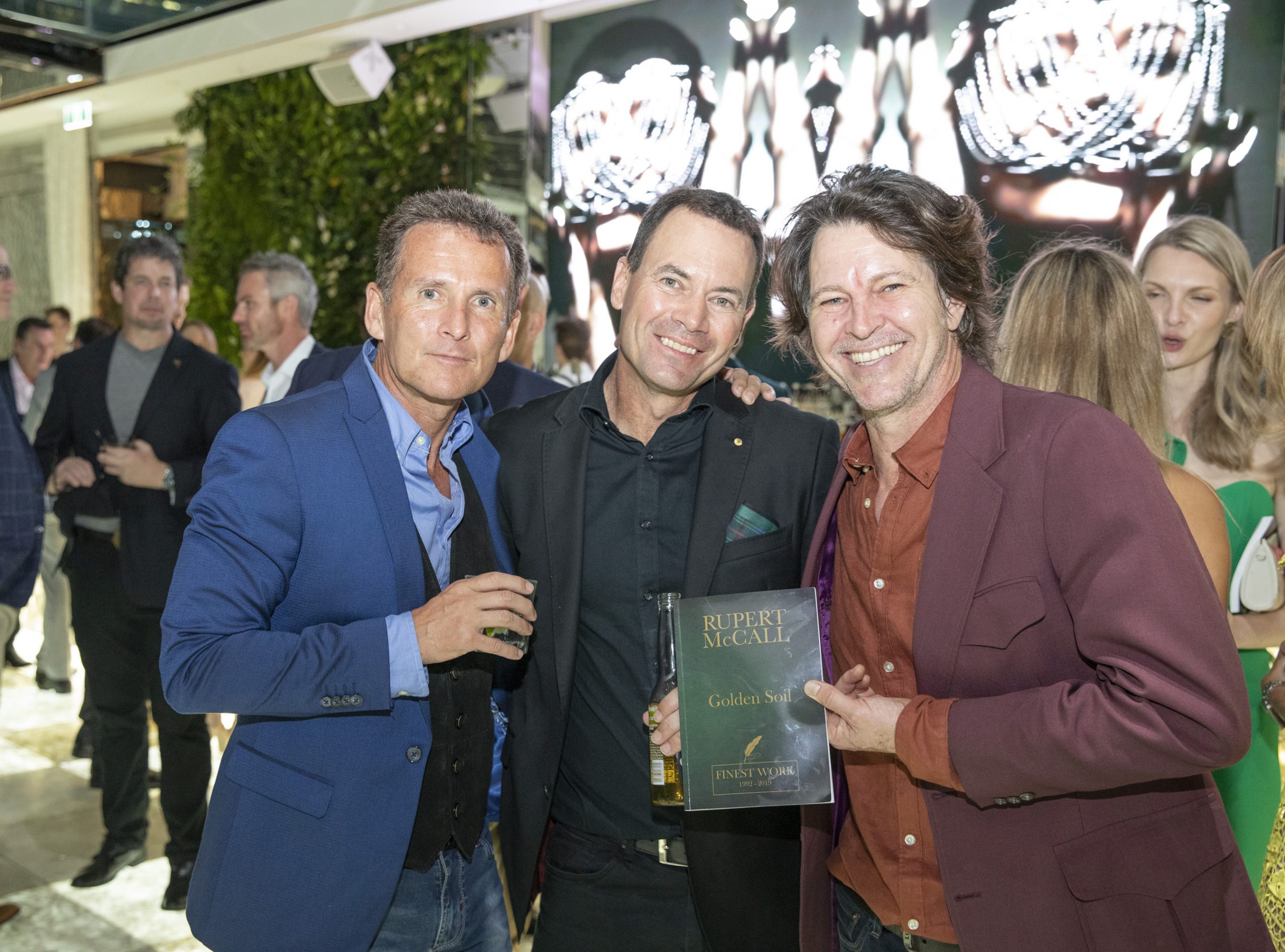MILESTONE: Go Transit chief operating officer Rick Chapman, poet Rupert McCall OAM and
Australian singer and musician Bernard Fanning at the launch of Mr McCall’s Golden Soil poetry anthology.
