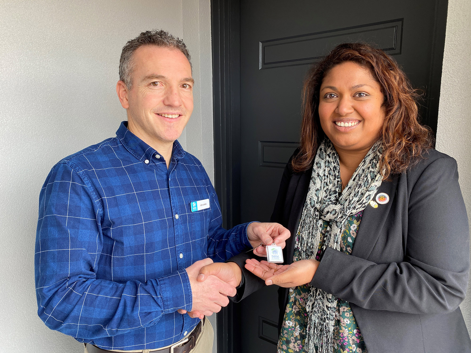 PROJECT MILESTONE: Habitat for Humanity South Australian executive director Ben Sarre hands over the keys to the Studio Purpose apartments to ac.care Murraylands homelessness program manager Thanuja Hiripitiyage.