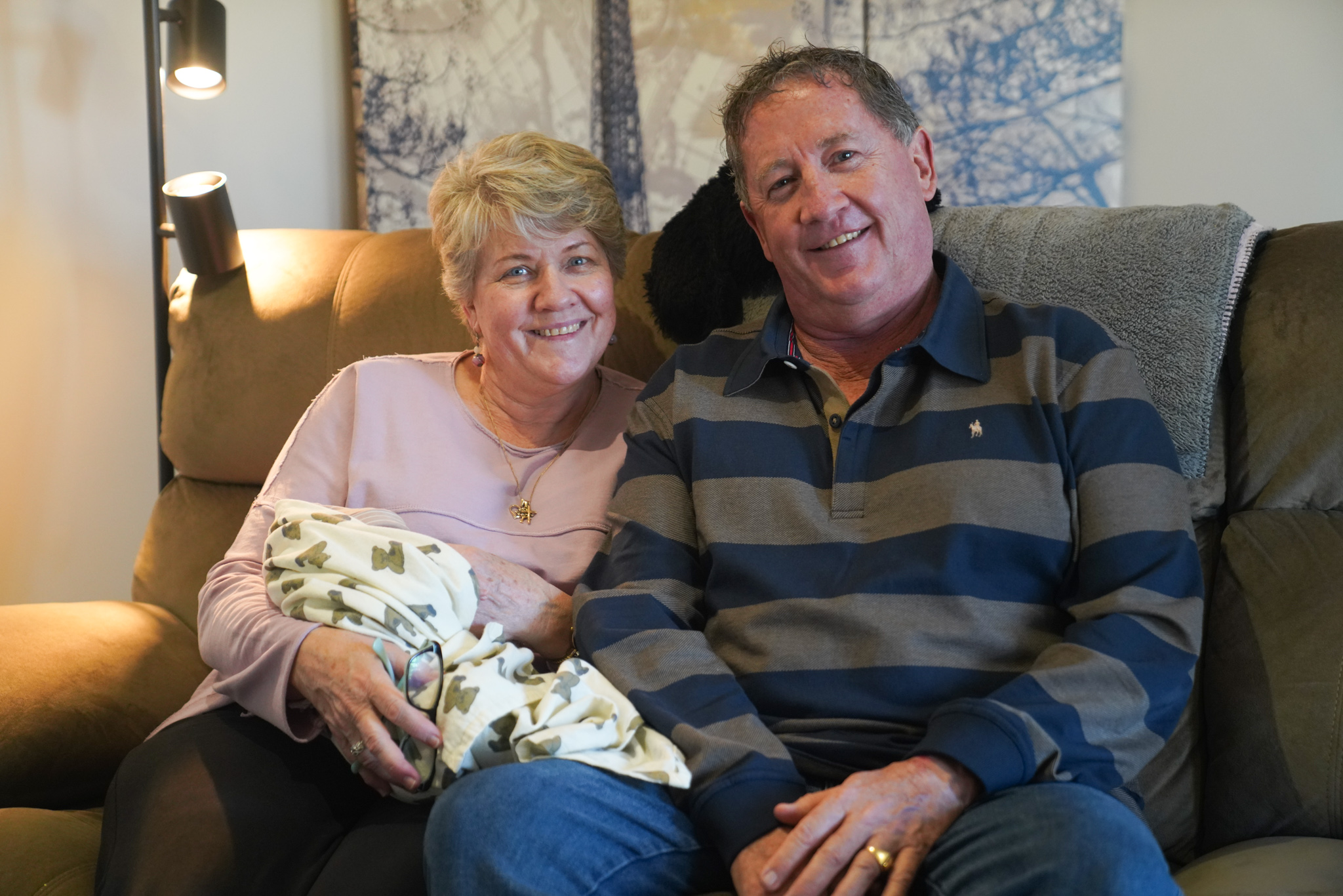 GIVING BACK: Riverland retirees Deb and Peter Kennedy have welcomed vulnerable children, including babies, into their home after becoming foster carers with ac.care and urged other caring adults to also consider providing safe homes and positive relationships for local children in need of support.