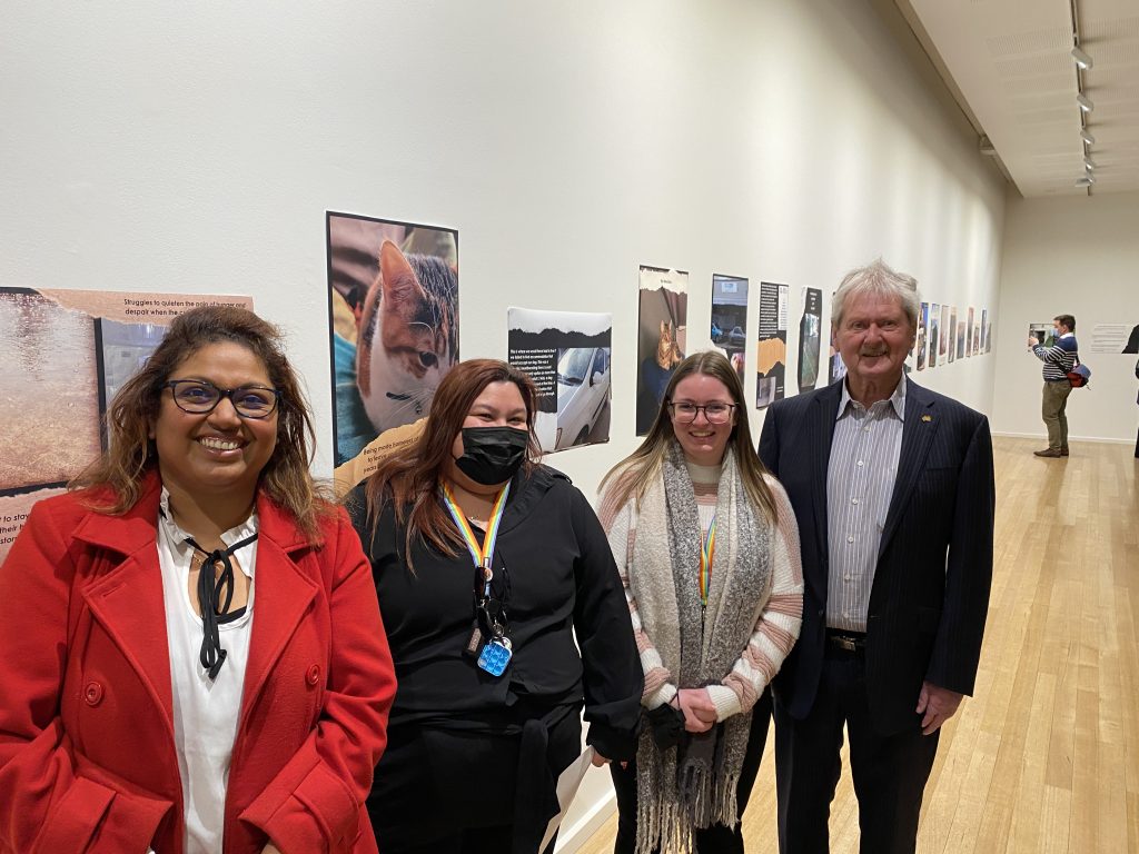 TEAMWORK: ac.care Murraylands Homelessness Service manager Thanuja Hiripitiyage, homelessness client support workers Nickeala and Skye and Rural City of Murray Bridge Mayor Brenton Lewis at the Reflections on Homelessness – Our Future Can Still Be Bright exhibition.