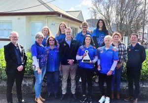 TEAMWORK: Staff at ac.care’s Mount Gambier Community Centre celebrate the agency being presented with the Community Conscience award at the 2023 Women in Business and Regional Development and Mount Gambier Chamber of Commerce Awards.